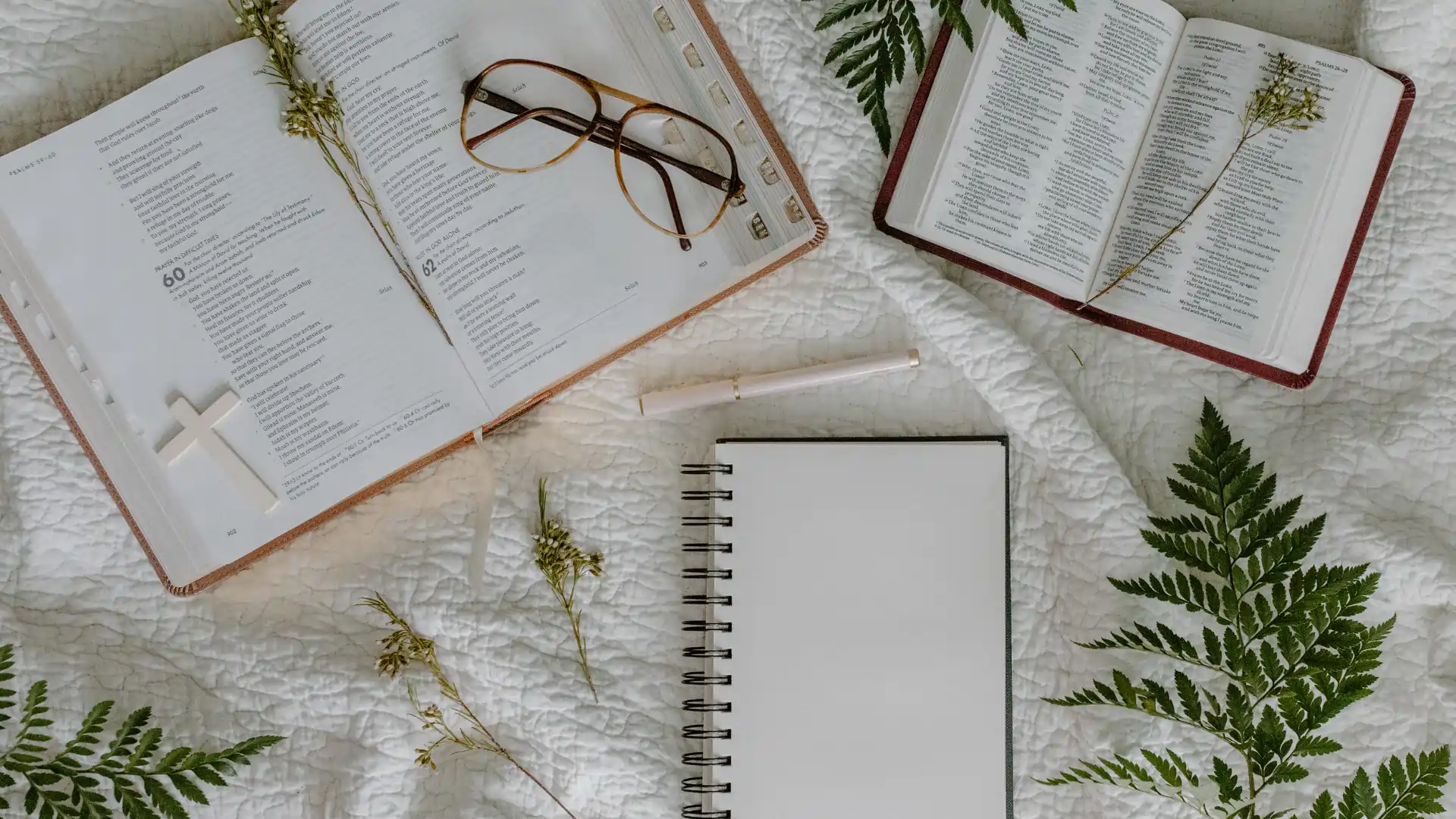 pastor sermon preparation with bible and note book
